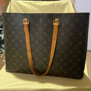 Authentic Louis Vuitton large monogrammed canvas brown tone tote.